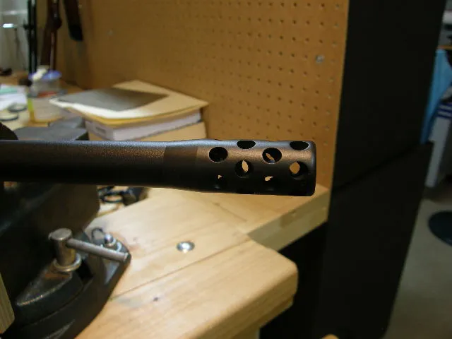 Gentry muzzle brake installed on a barrel