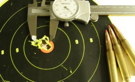Ten shot group on a target measured with calipers